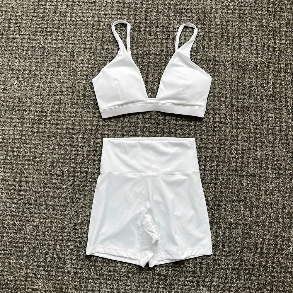 Breathable Elastic Women's Suit of Shorts and Sports Bra SF1757, ideal for yoga and workouts, featuring a sleek design in white.
