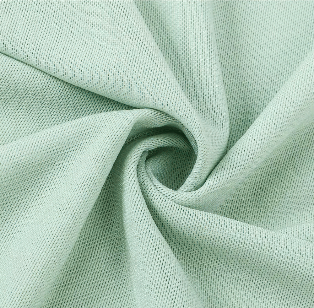 Close-up of light green breathable mesh fabric, perfect for activewear and yoga tops like the SF2319.