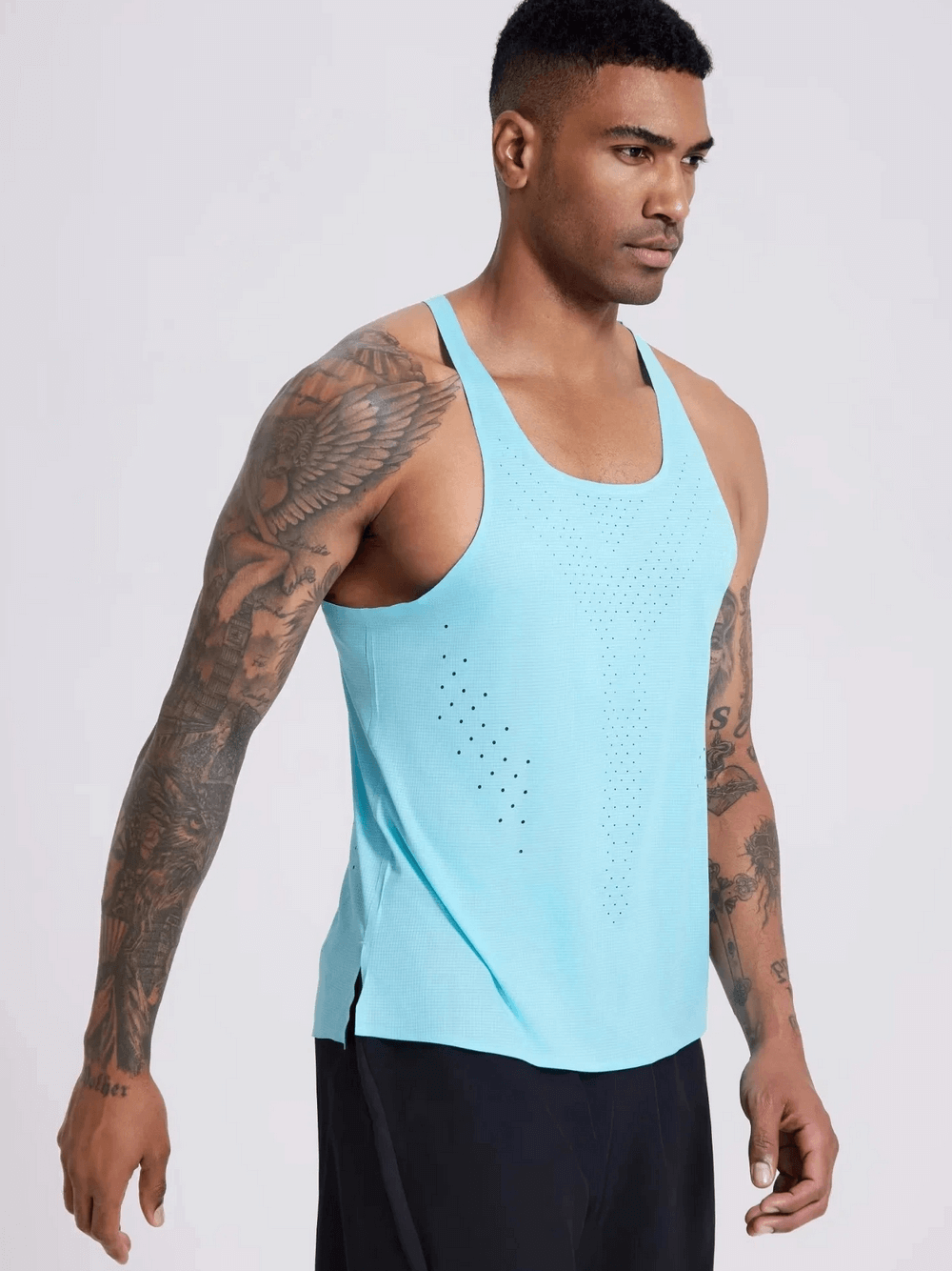 Athletic man wearing breathable blue men's tank top SF2154, ideal for workouts with optimal airflow and elastic fit.