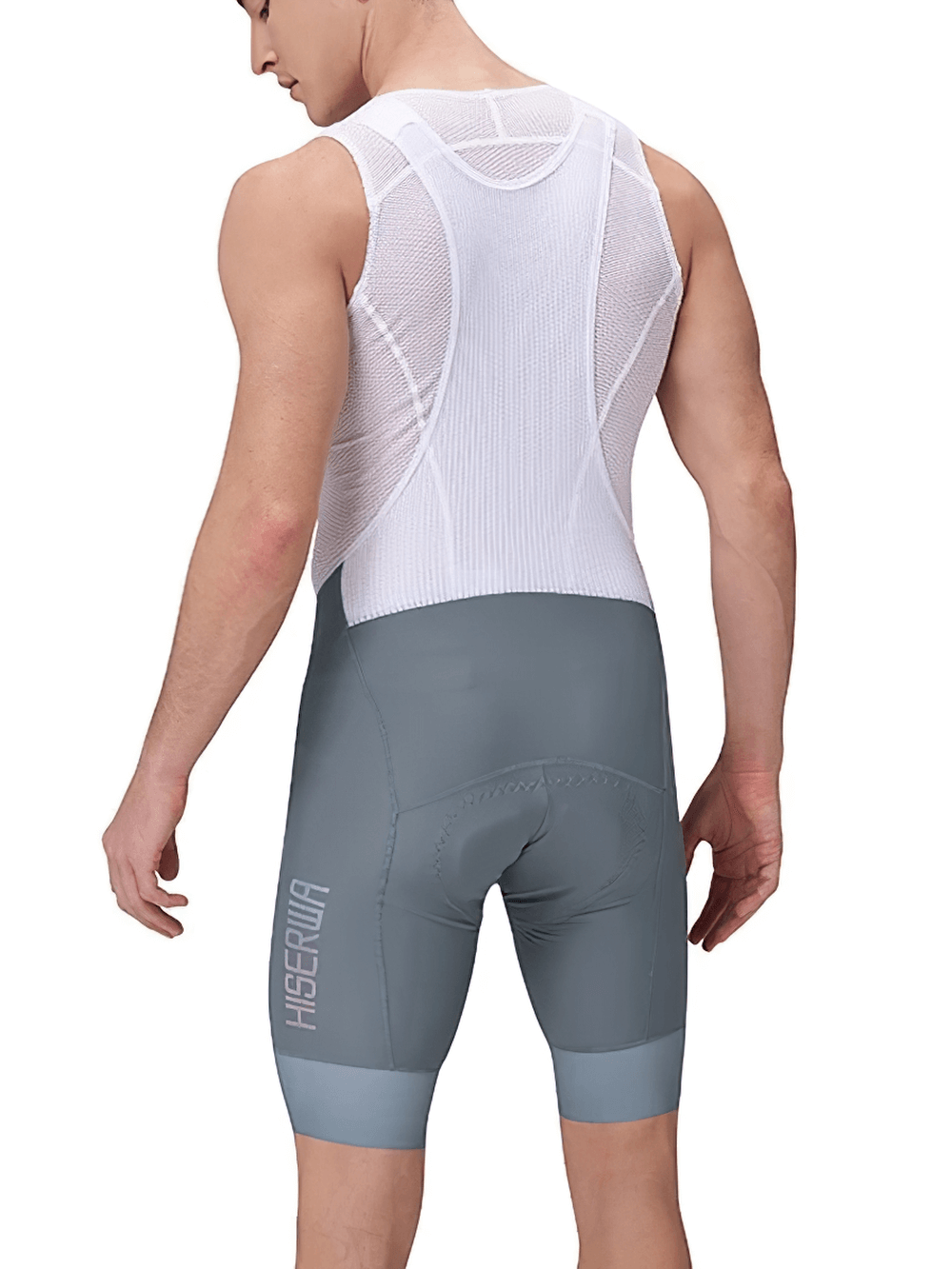 Man wearing breathable men's pro cycling bib shorts with ergonomic design for endurance rides.