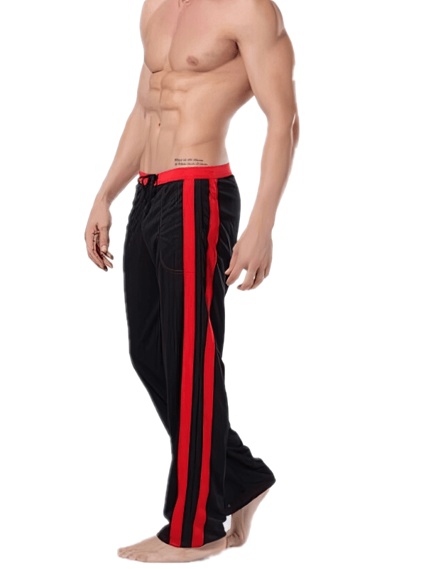 Model wearing breathable men's sports training pants with red stripes, SF1315, featuring elastic waist and side pockets for workouts.