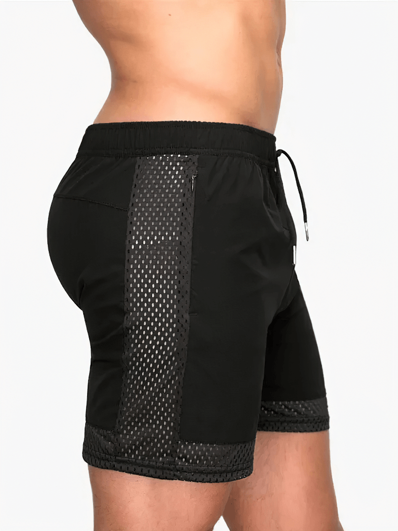 Men's breathable mesh black athletic shorts with quick-dry tech and stylish mesh panel for optimal movement and airflow, side view.