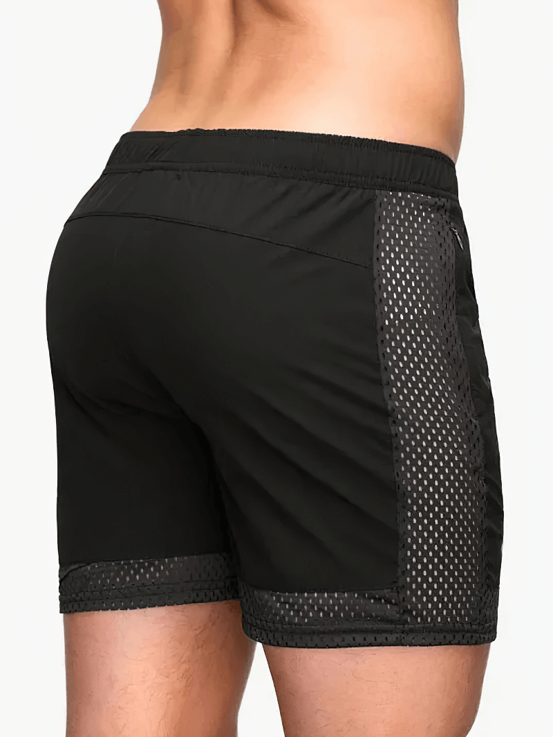 Back view of men's breathable mesh black athletic shorts with quick-dry technology and stylish mesh panel for enhanced ventilation.