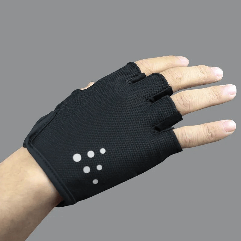 Unisex breathable mesh half-finger cycling gloves with dot design shown on hand, ideal for cycling and climbing activities.