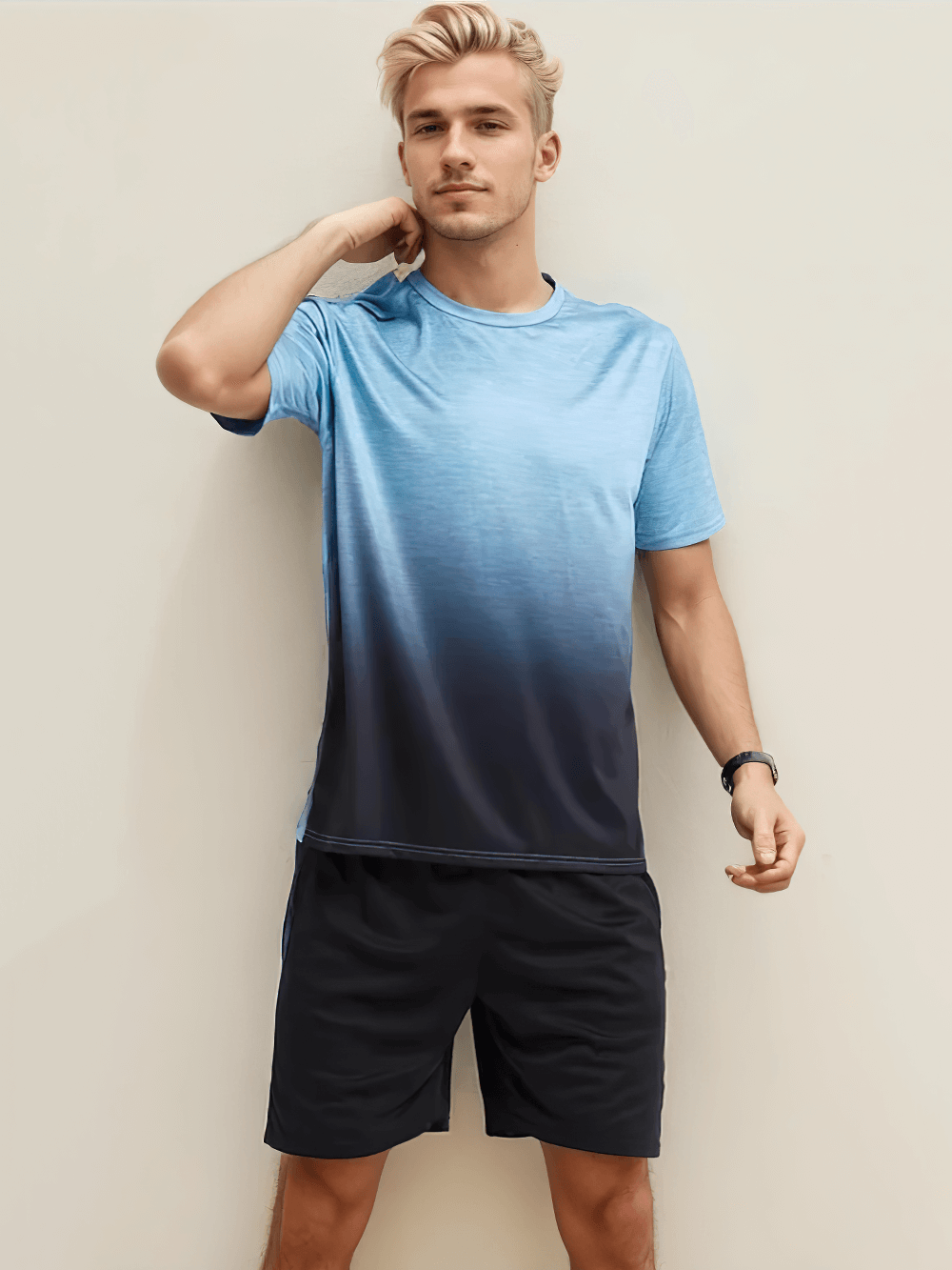 Model wearing breathable o-neck tee and shorts set SF2049, quick-dry sportswear for men with gradient design, ideal for workouts.