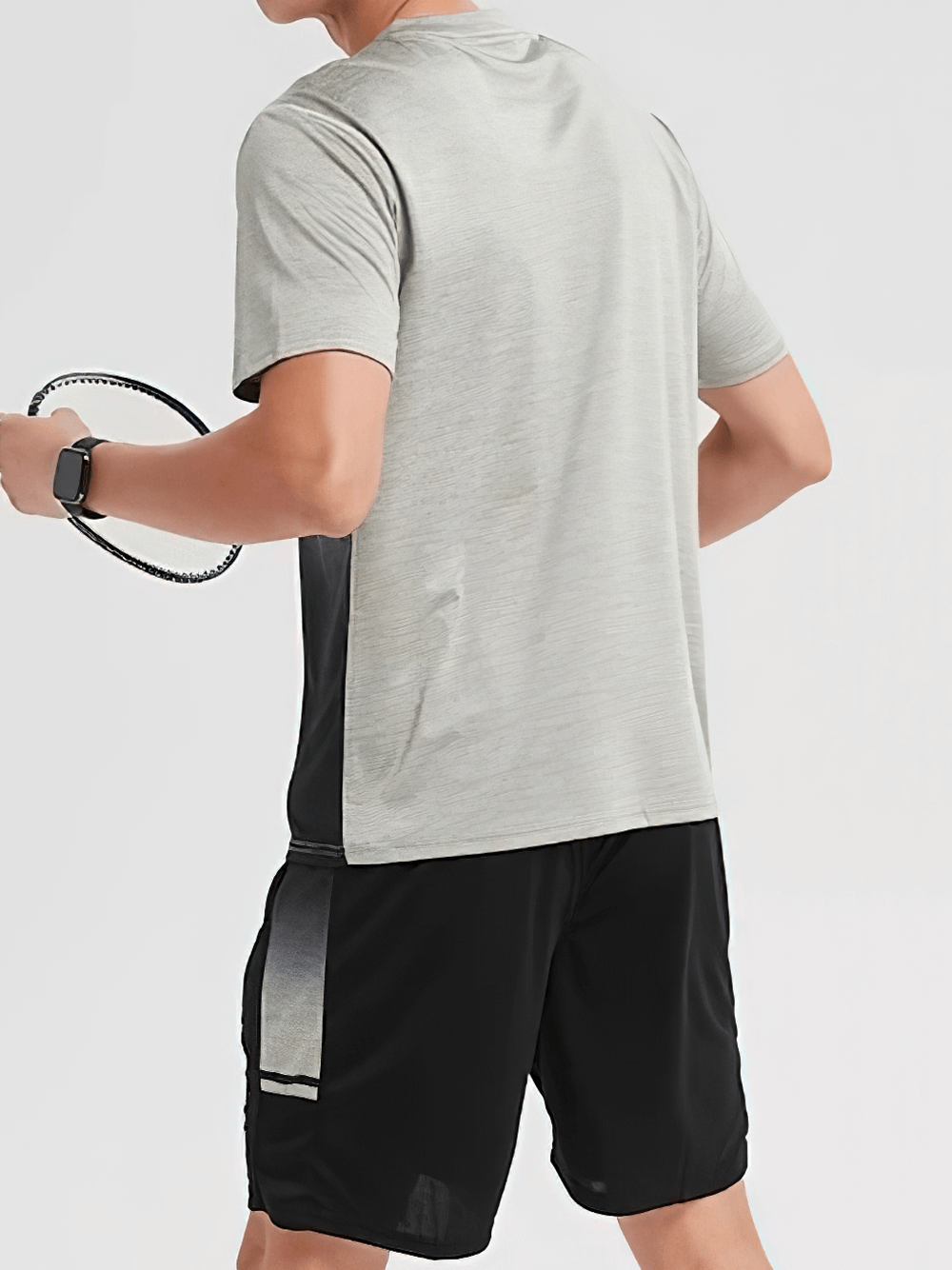 Quick dry breathable O-neck tee and shorts set for men, perfect for workouts. Features stylish print pattern. Material: Polyester, Spandex.