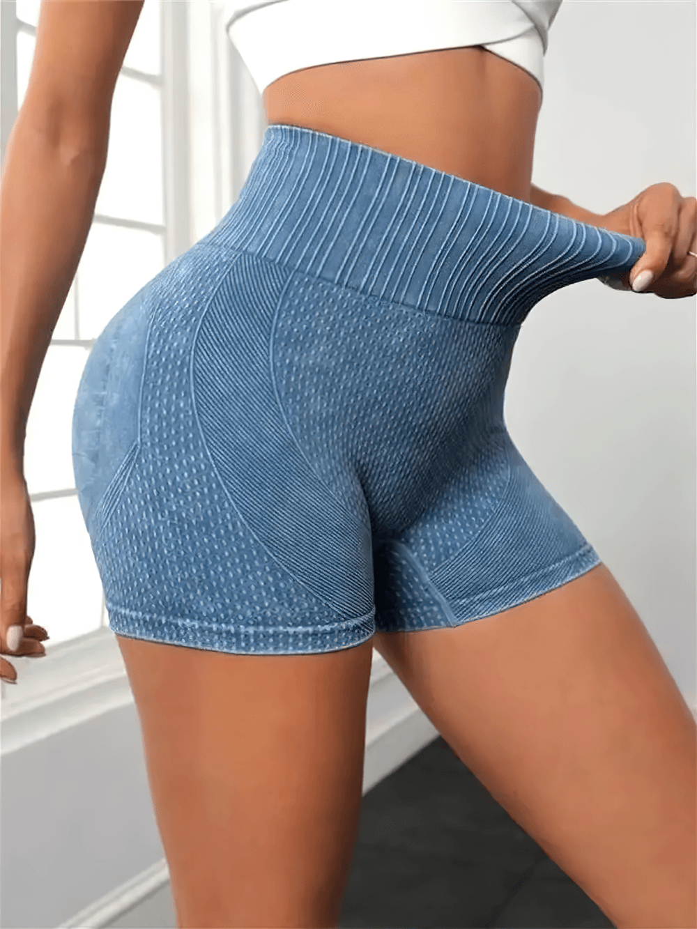Woman wearing blue Breathable Scrunch Seam Gym Cycling Shorts - SF4153 for yoga and workouts.