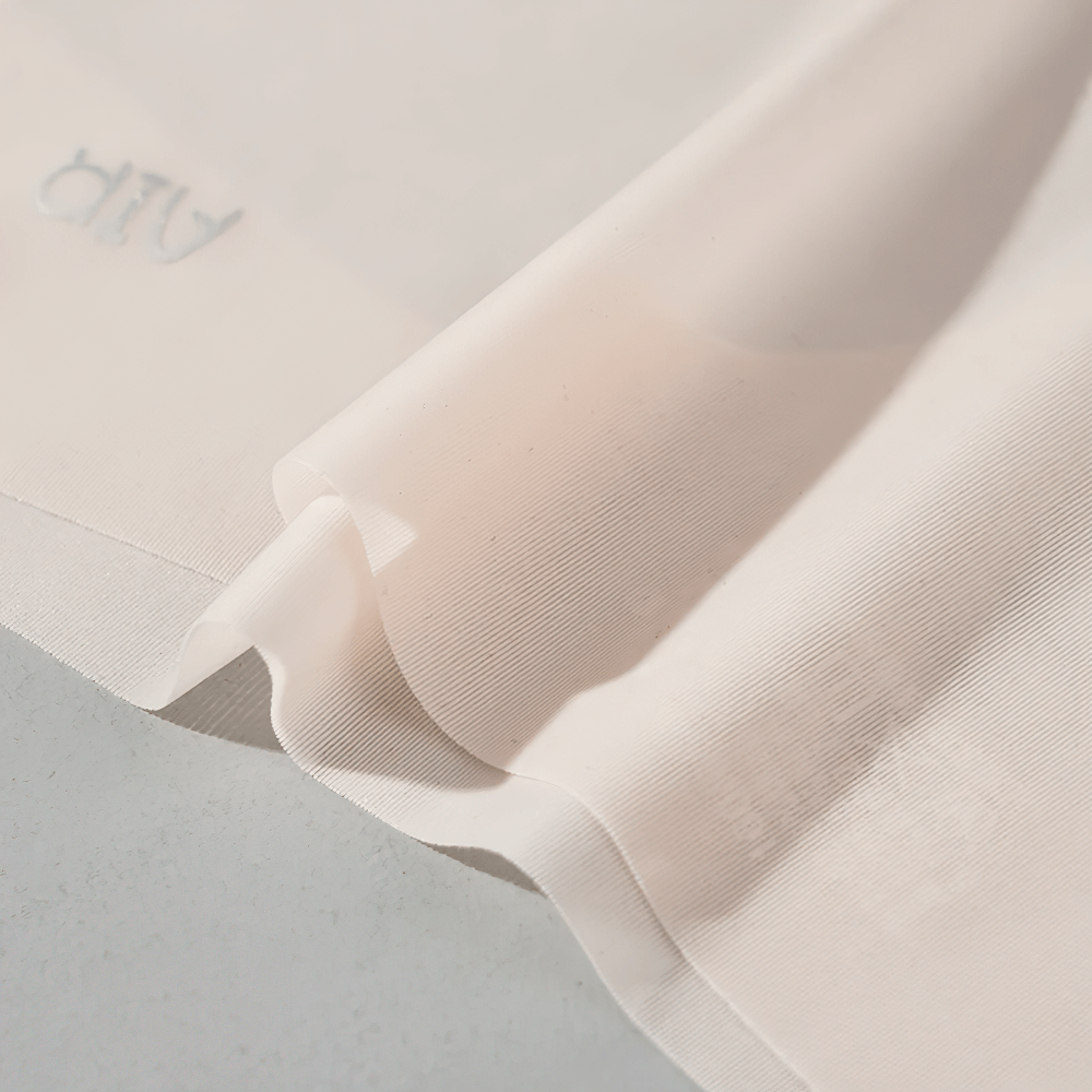 Breathable seamless invisible thong underwear with laser-cut edges and soft, lightweight fabric for a no-show effect.