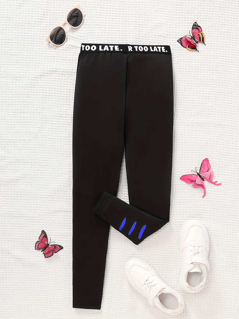 Butterfly Girls Sports Leggings with Elastic Waist - SF3795 featuring vibrant prints and elastic band displayed with sneakers and sunglasses.