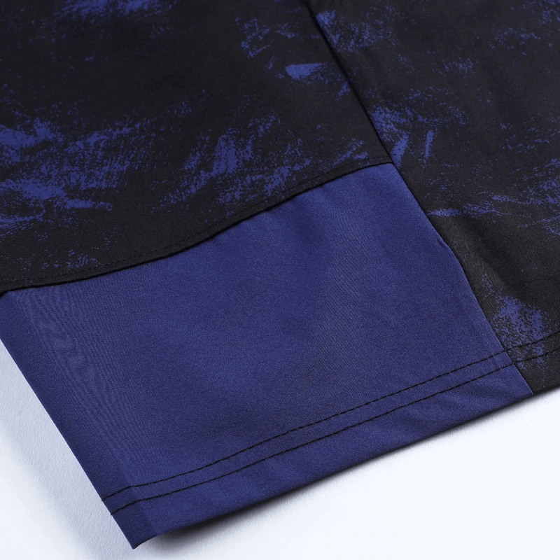 Close-up of breathable camo running shorts showcasing lightweight fabric and trendy design in blue and black.