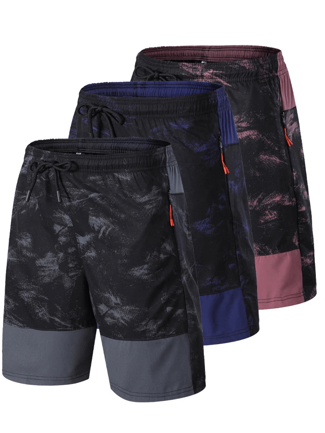 Three pairs of camo running shorts in different colors showcasing breathable and lightweight design for optimal athletic performance.