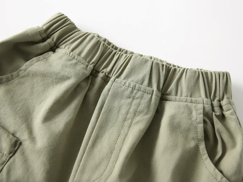 Close-up of Cargo Shorts With Pockets And Drawstring Design - SF3721 showing elastic waistband and pockets for boys' outdoor adventures.