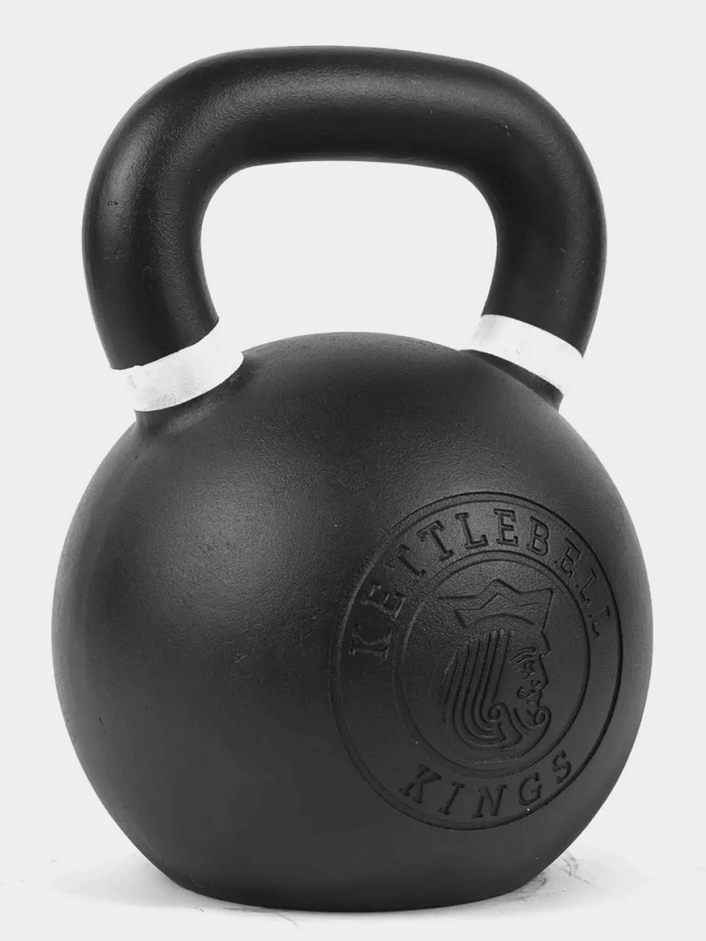 Black cast iron kettlebell for strength training and fitness workouts, featuring an ergonomic handle and compact design.
