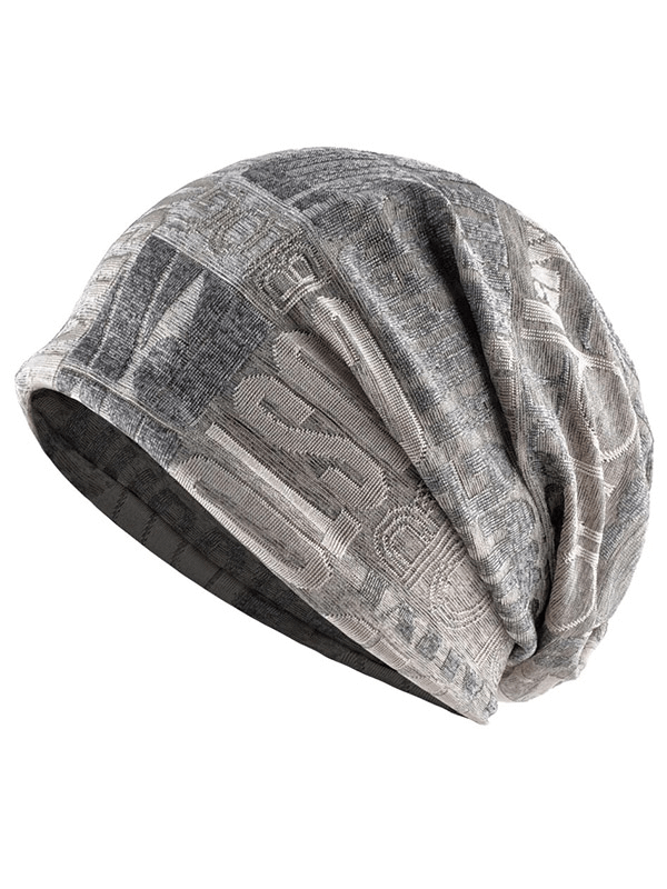 Casual unisex scarf-hat with knitted letters and flower pattern in cotton and polyester, perfect for stylish outdoor activities.