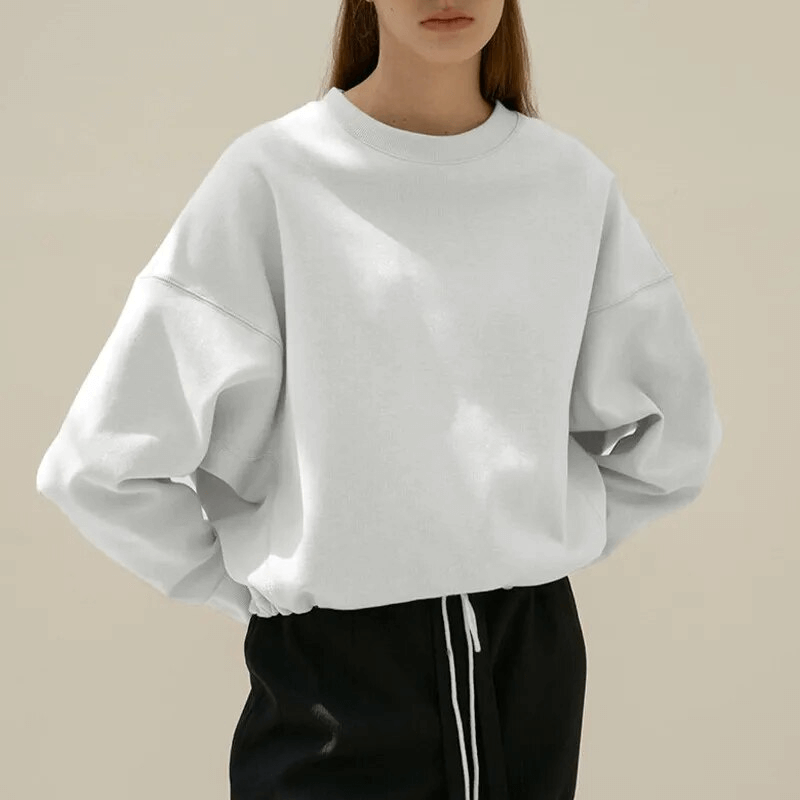 Casual solid women's hoodie in white, O-neck, loose fit, 100% cotton with drawstring, perfect for style and comfort.
