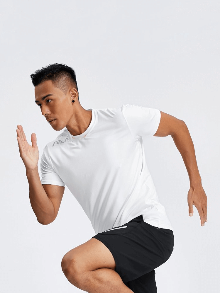 Athletic man running in Casual Sport Quick Dry Men's T-Shirt with Reflective Stripes, showcasing breathable polyester and stylish design.
