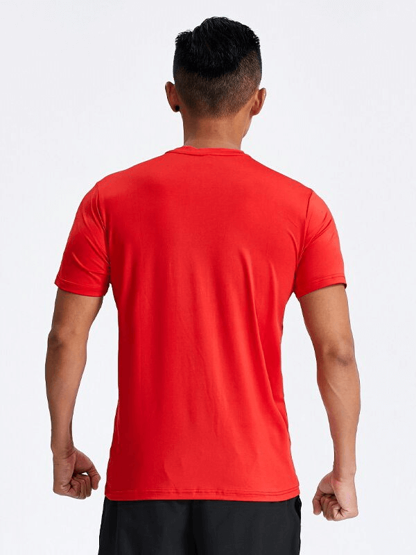 Back view of a man wearing a red Casual Sport Quick Dry Men's T-Shirt with Reflective Stripes, ideal for workouts and outdoor activities.