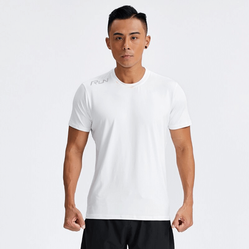 Model wearing white casual sport quick dry men's t-shirt with reflective stripes, perfect for workouts and maximum comfort.