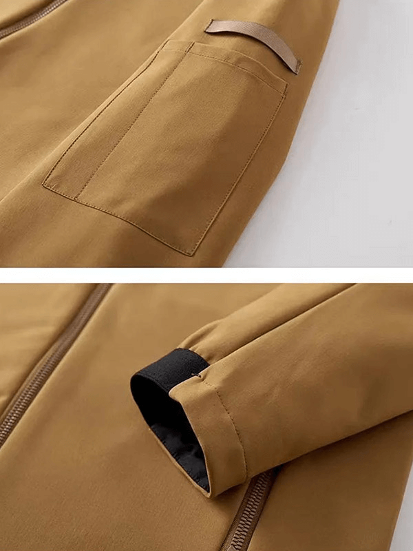 Close-up of a tan casual men's waterproof jacket showing pocket and sleeve with zipper closure.