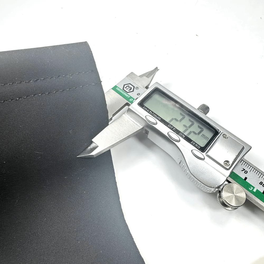 Digital caliper measuring thickness of Chalk Grips for Weightlifting and CrossFit Training - SF3504 for precision design.