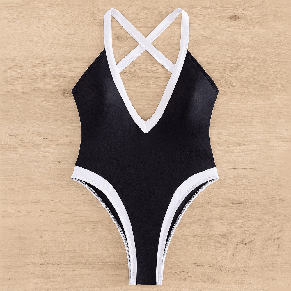 Chic black and white one-piece swimsuit with crisscross neckline, elegant monochrome design, SF2149, flattering cutouts for modern style.