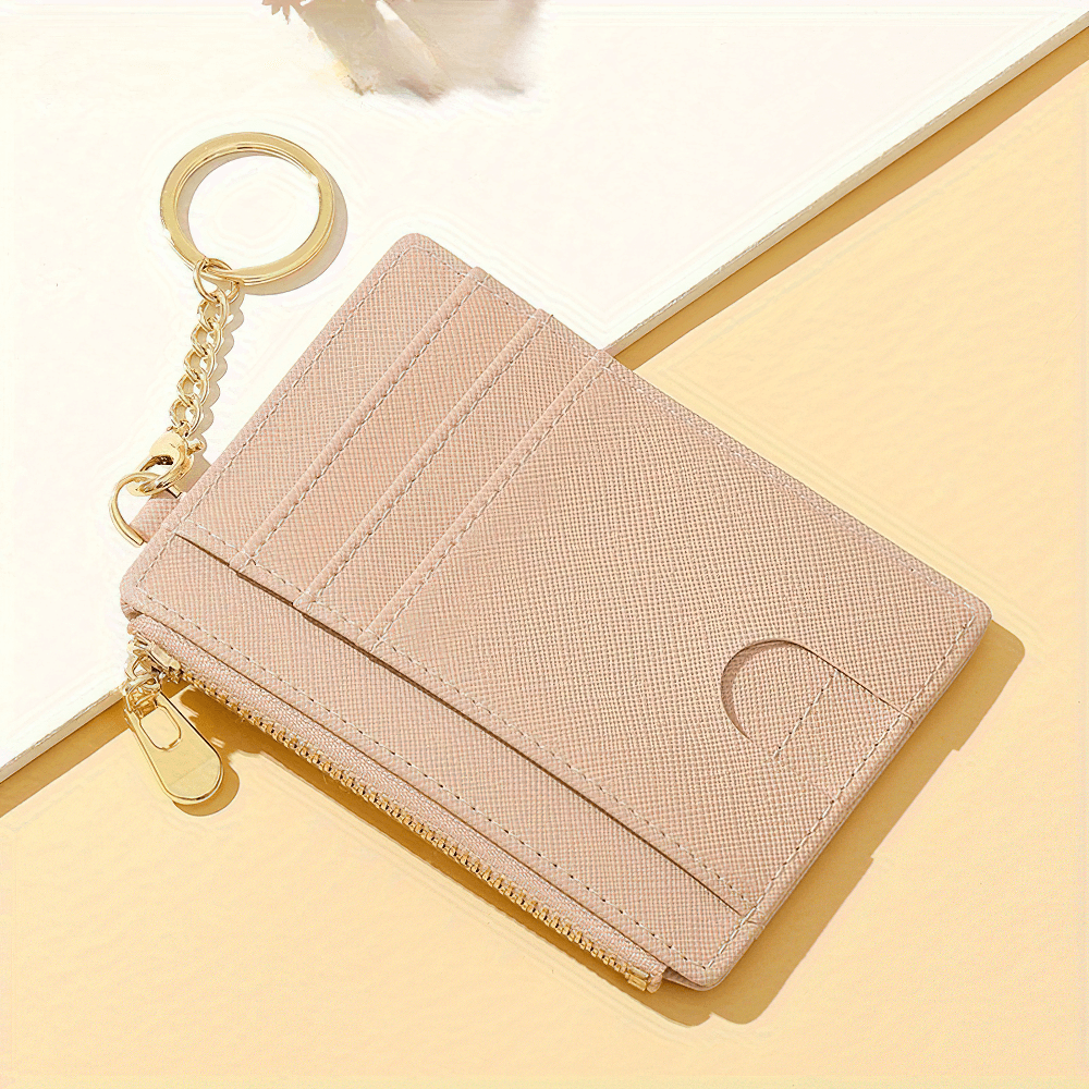 Chic mini PU leather wallet with card slots and keychain, ideal for everyday use, in stylish beige with secure zipper closure.