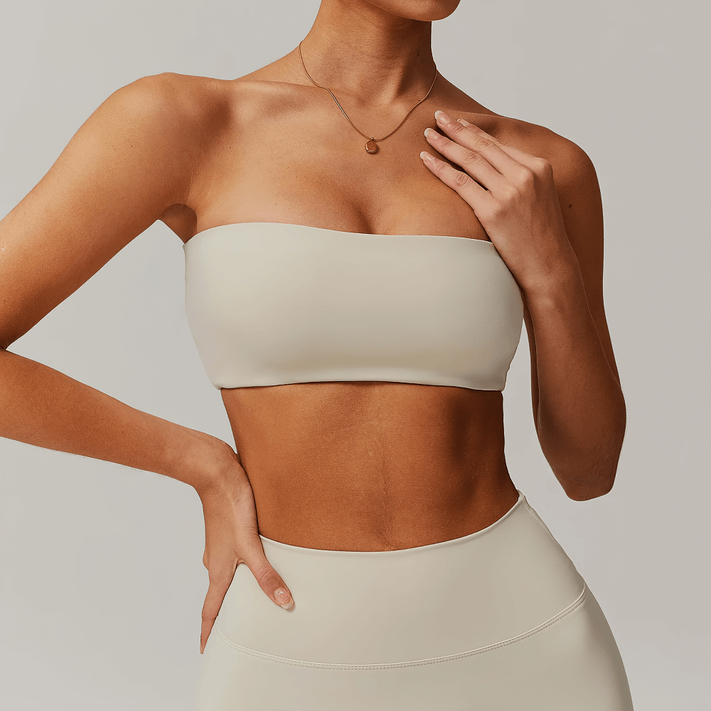 Neutral strapless bandeau crop top - minimalist style for modern looks, perfect for layering or solo wear, versatile fashion staple.