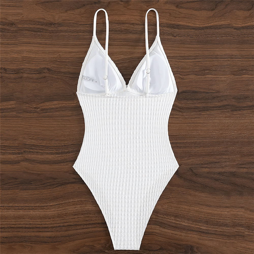 Chic white one-piece swimsuit SF2142 for women, perfect for beach days. Stylish, nylon material with a classic silhouette. Summer essential!