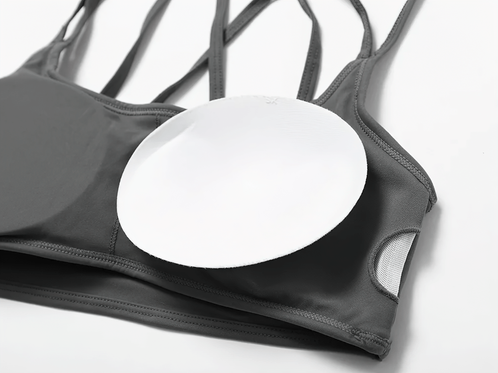 Versatile Cross-Back Sports Bra with Supportive Padding for Active Women - SF2463. Perfect for gym and casual wear.