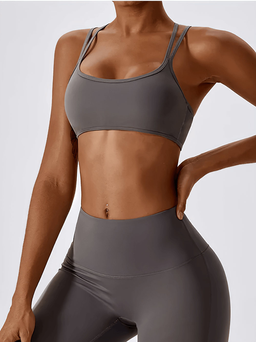 Chic Women's Sports Bra with Cross-Back Design, perfect for active wear. Offers maximum support and comfort for workouts.