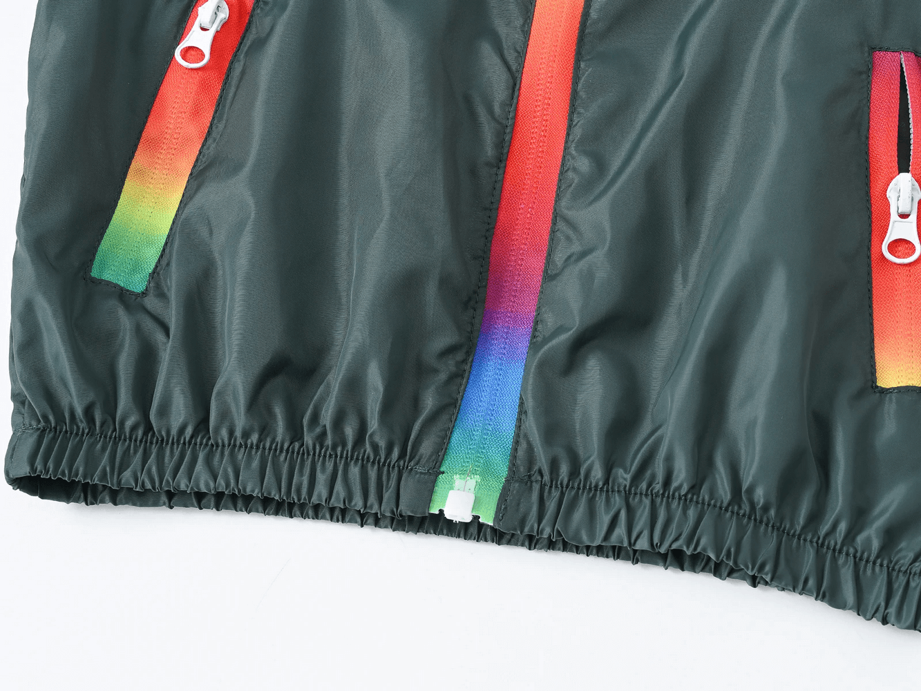 Close-up of Children's Rainbow Zipper Hooded Jacket - SF3639 showing rainbow zipper details and elastic cuff trim.