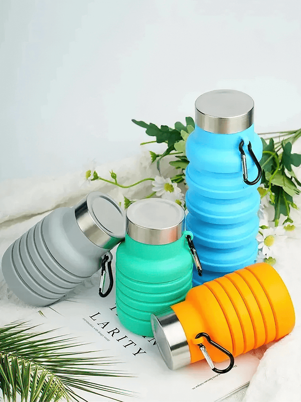 Colorful assortment of Collapsible Silicone Water Bottle for Hiking - SF3485 with carabiners, perfect for outdoor adventures.