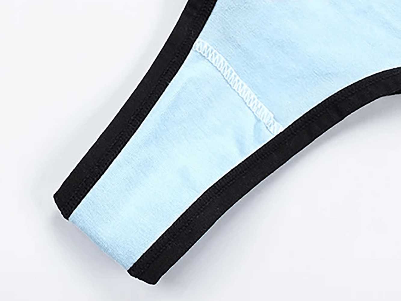 Color Block Cotton Thong with Striped Waistband - SF4634 close-up of the light blue fabric and black trim details.