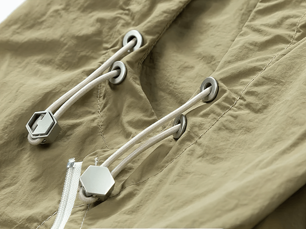 Color Block Hooded Windbreaker Jacket with Pockets - SF4725 adjustable drawcord hem detail close-up.