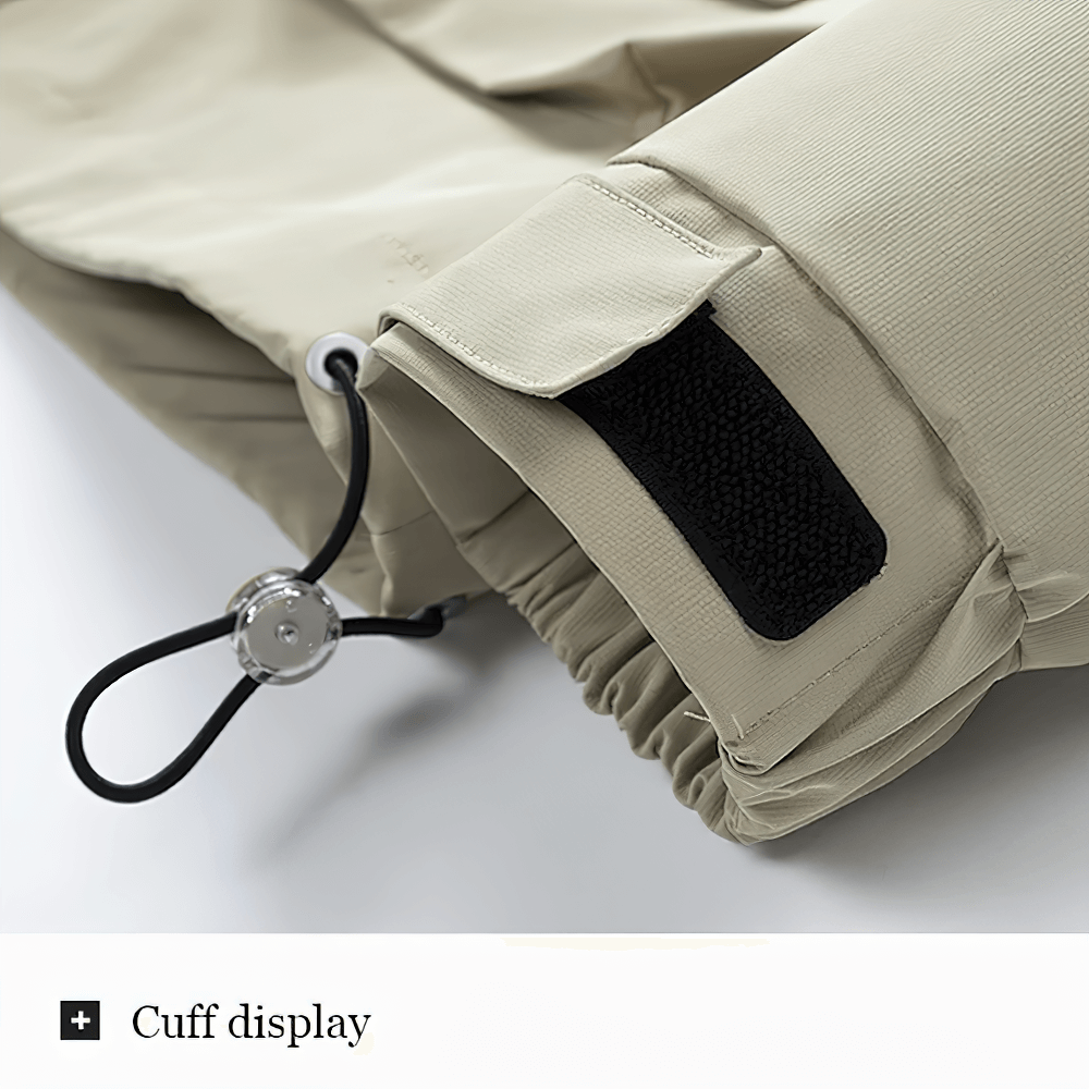 Close-up of a sleeve cuff on the Color-Block Jacket with Adjustable Hood and Pockets - SF4204, showing elastic detail and toggle cord.