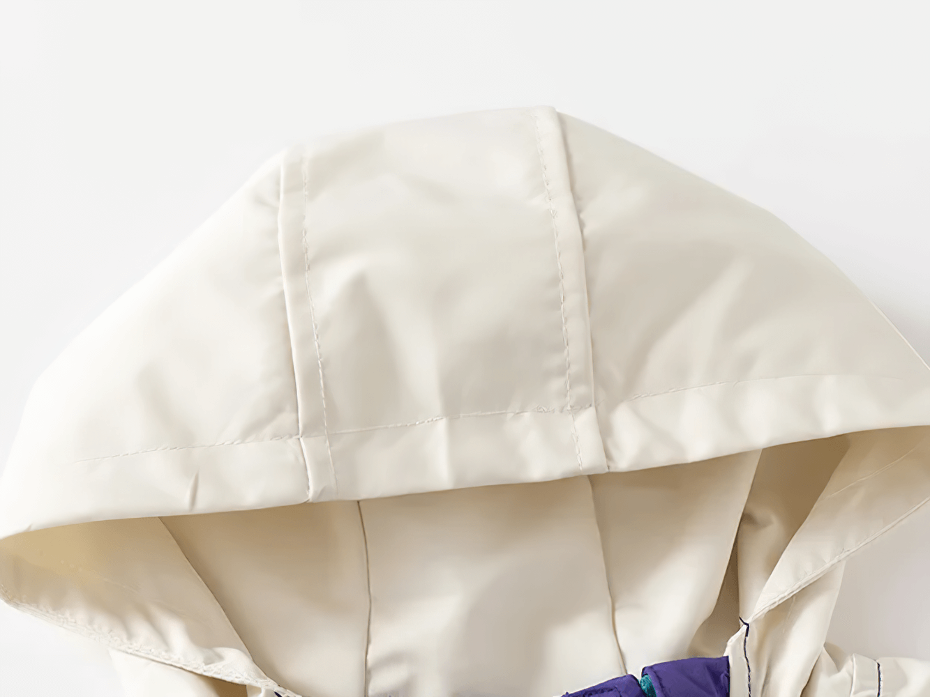Close-up of hood from the Color-Blocked Zipper Hooded Windbreaker Jacket - SF3714, showing stylish beige fabric for kids' outdoor adventures.