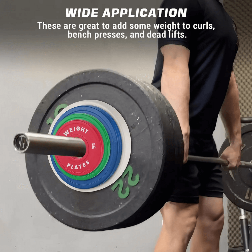 Person lifting barbell with color-coded weight plates for strength training, featuring low noise and sleek design for gym and home use.
