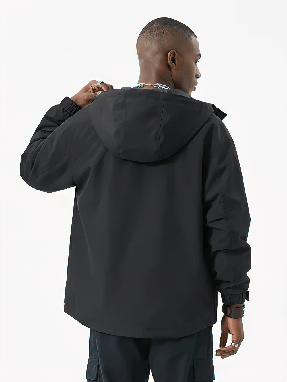 Back view of a model wearing the Colorblock Half Zip Hooded Windbreaker Jacket - SF4689 in black.