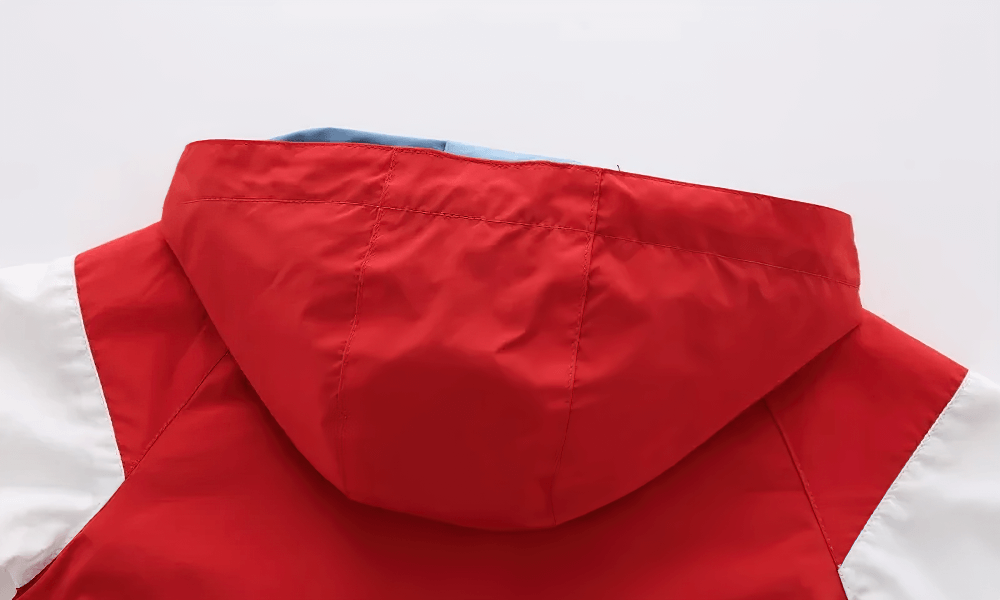 Close-up of a Colorblock Hooded Windbreaker Jacket for Kids - SF3603 in vibrant red and white colors.