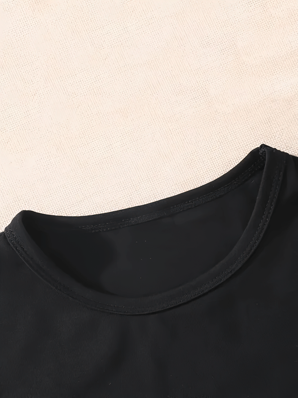 Close-up of Colorful Heart Drip Graphic T-shirt for Girls - SF3592 with black round neckline on a beige background.