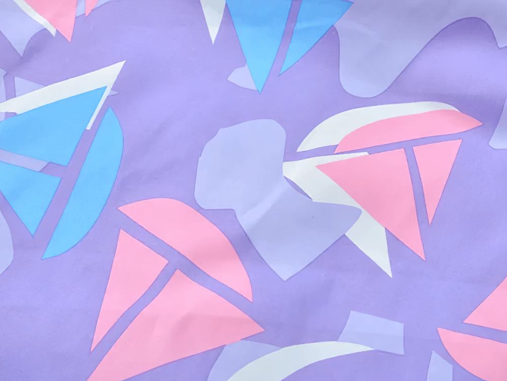 Close-up of Colorful Windbreaker Jacket with Fleece Lining - SF3579 showing vibrant geometric pink, blue, and purple design.