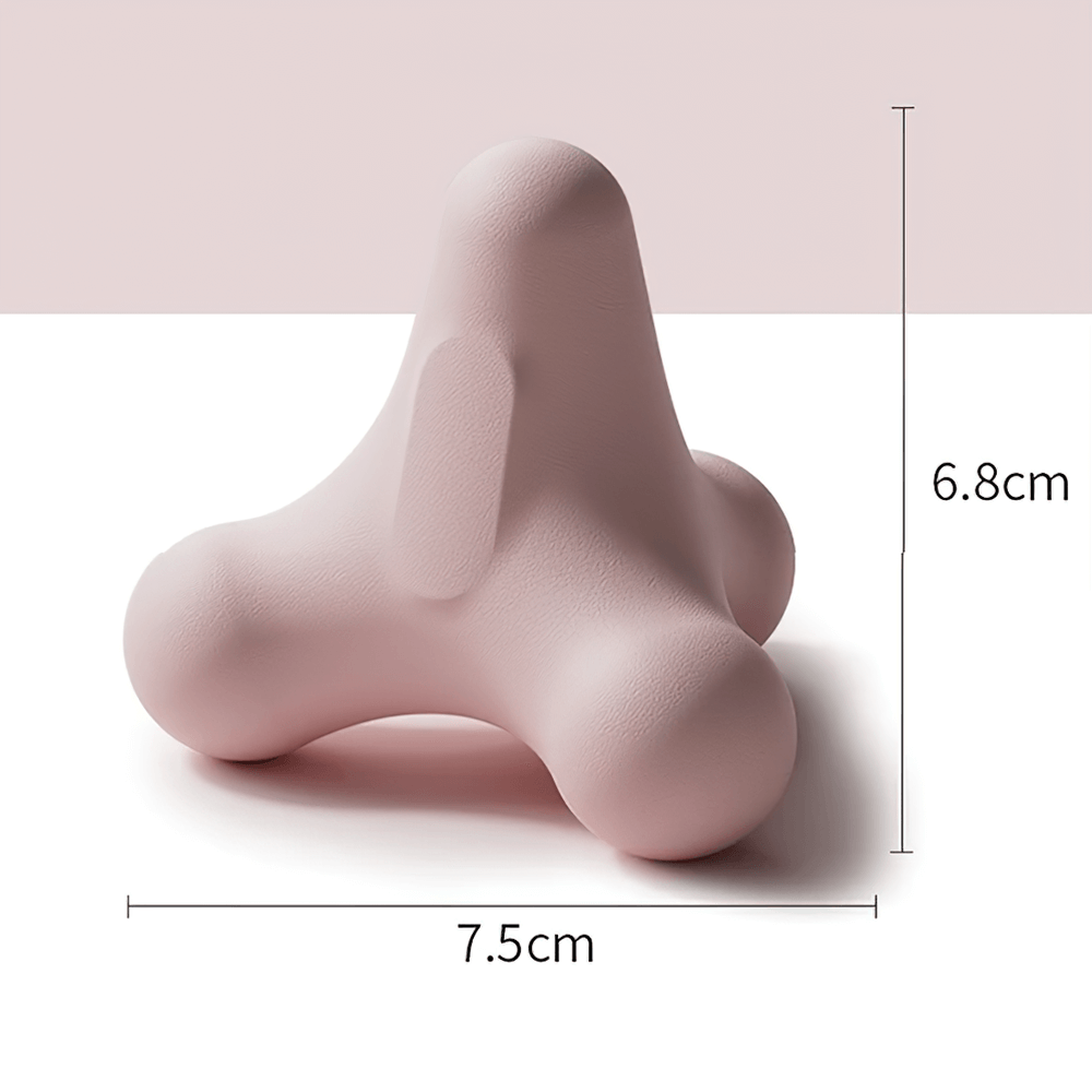 Compact 3D massage ball in light pink, ergonomic design with dimensions 7.5cm by 6.8cm, for easy muscle and foot relaxation.