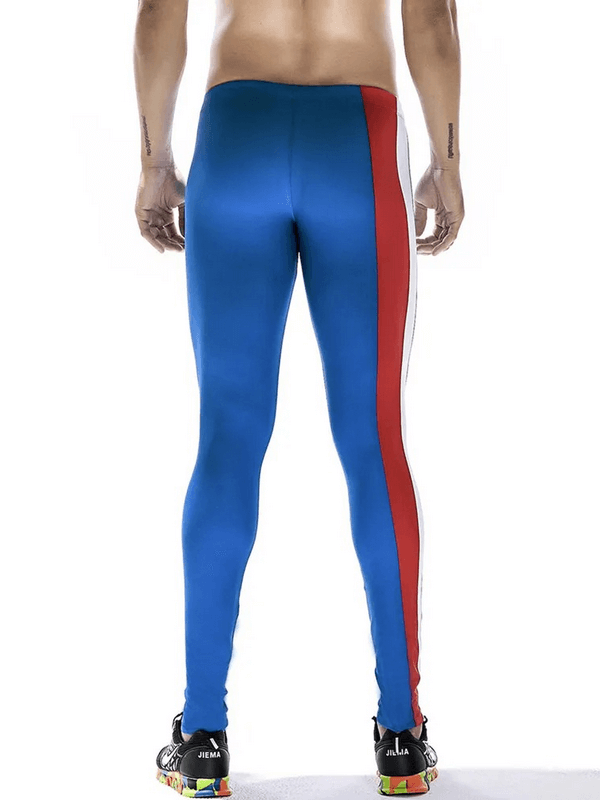 Back view of men's compression quick-drying tights SF1811 with blue and red patchwork design, ideal for running and training.