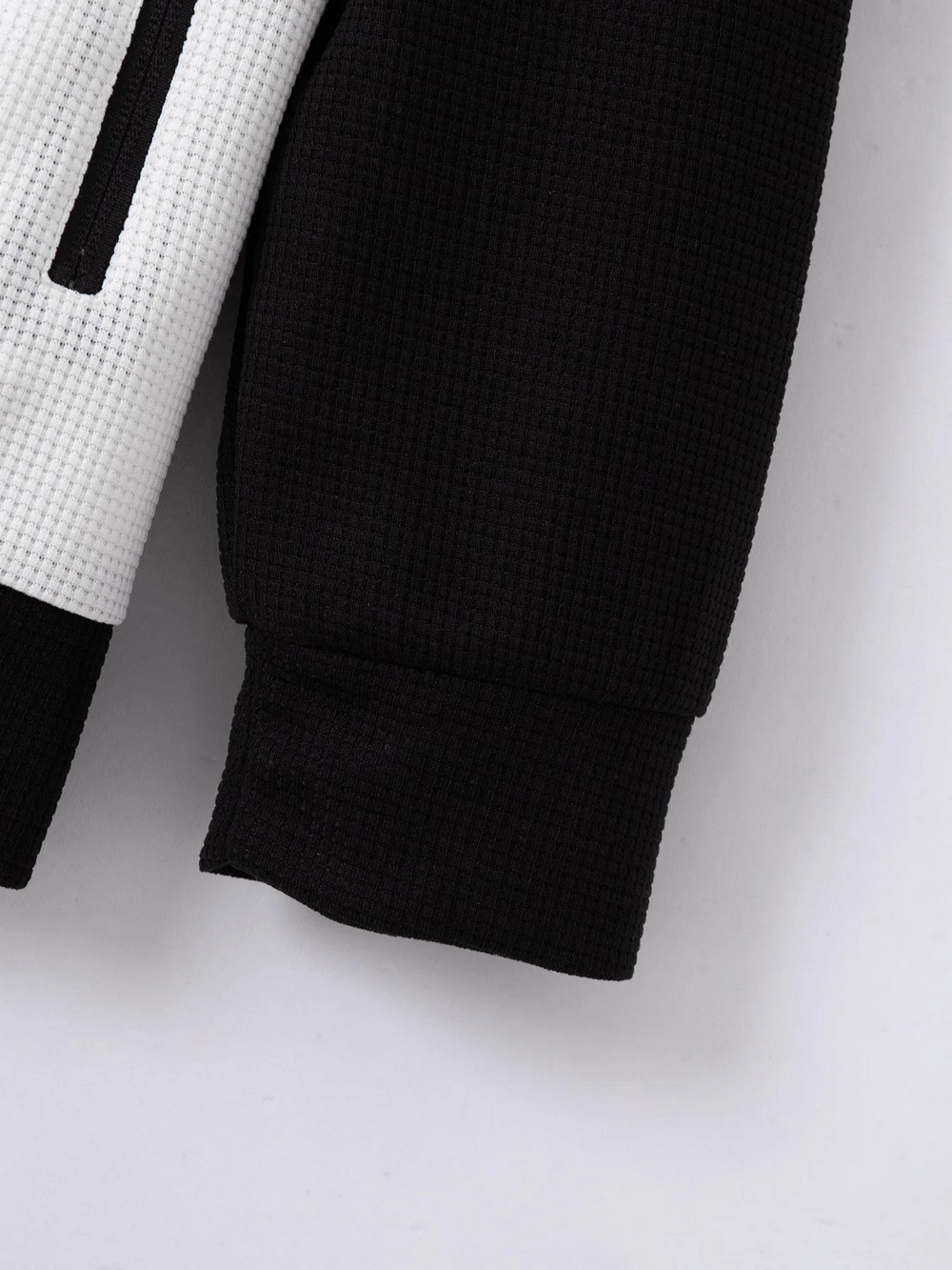 Contrast Color Stand Collar Jacket with Pockets - SF4643 close-up view of textured knit fabric and black sleeve