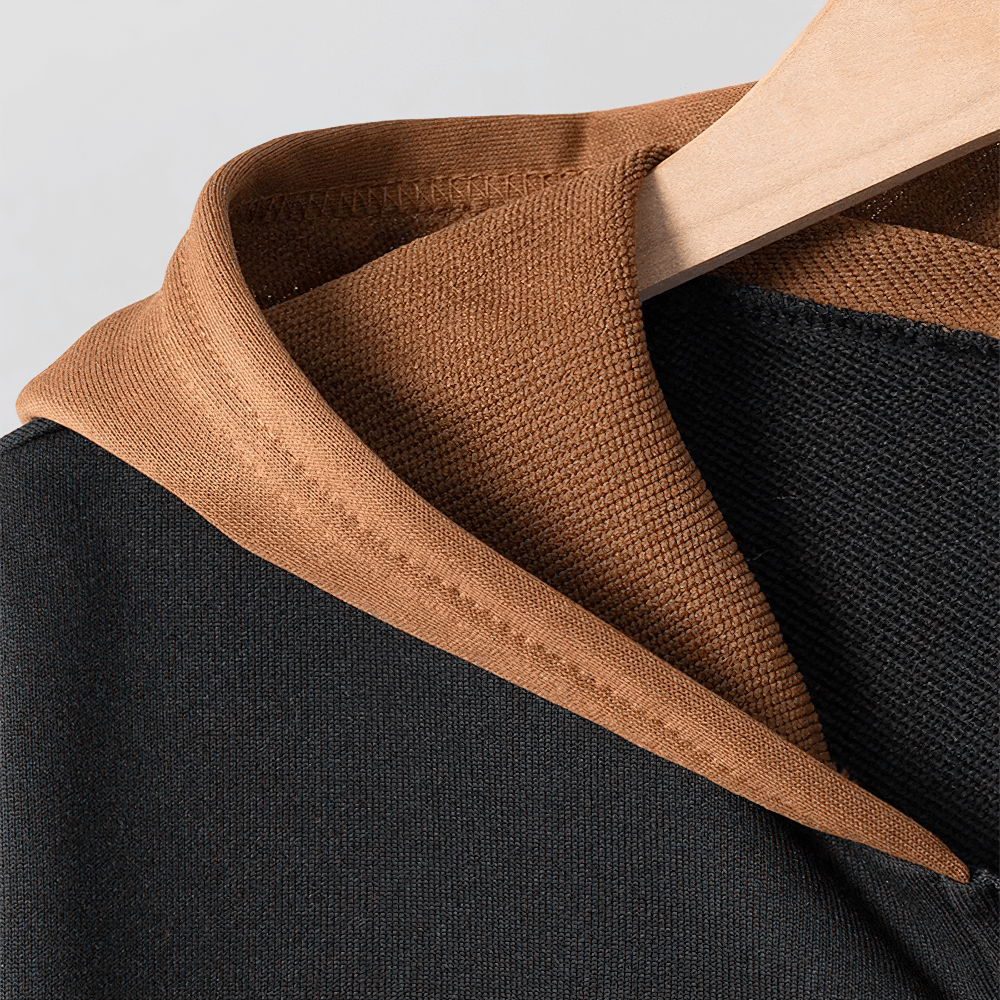 Close-up of a Contrast Hooded Zip Sweatshirt with Pockets - SF3669 featuring a stylish bicolor hood on a hanger.