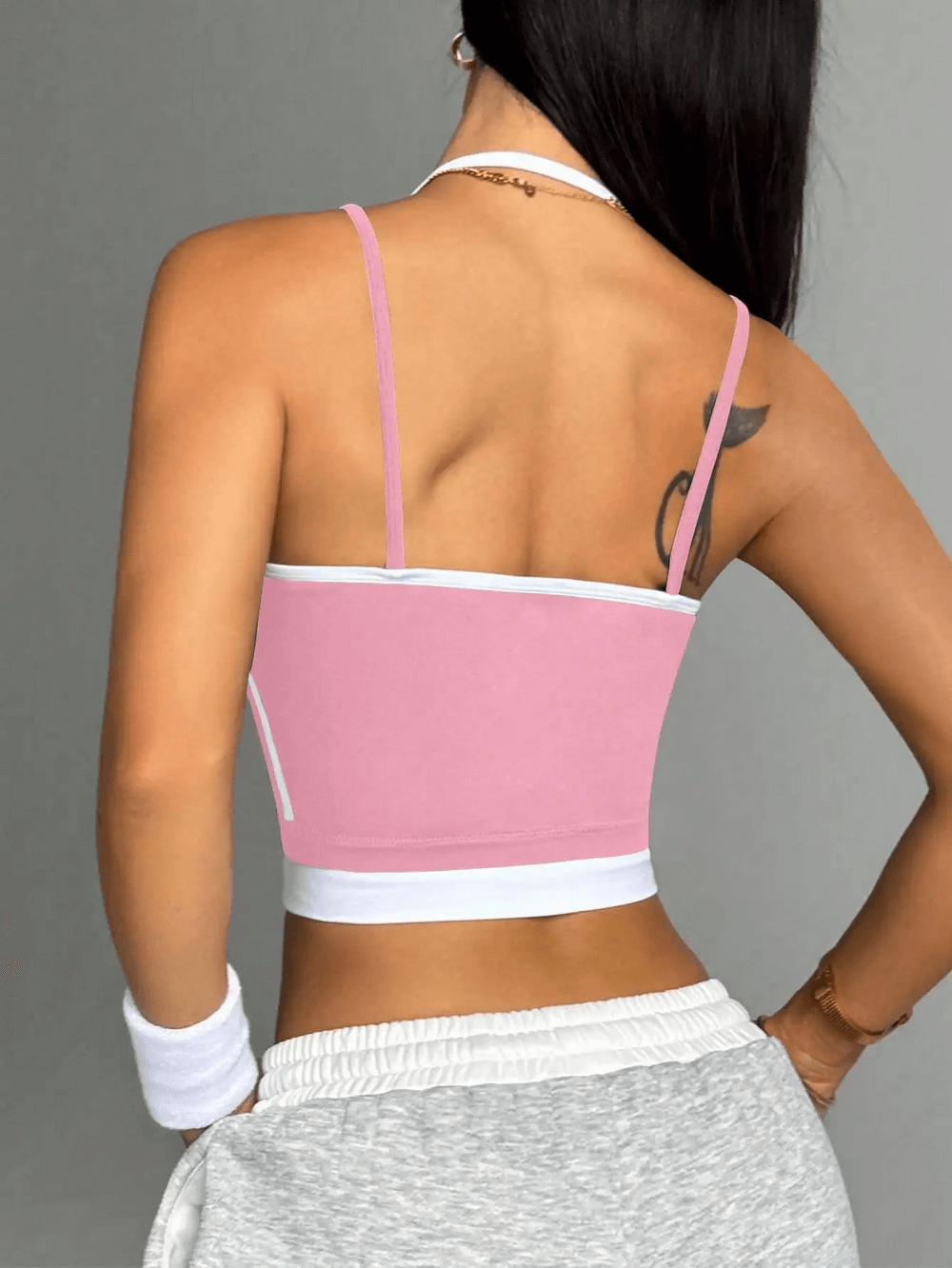 Woman wearing Contrast Trim Racerback Sports Bra Crop Top - SF4001 with halter back and white trim, perfect for yoga and gym.