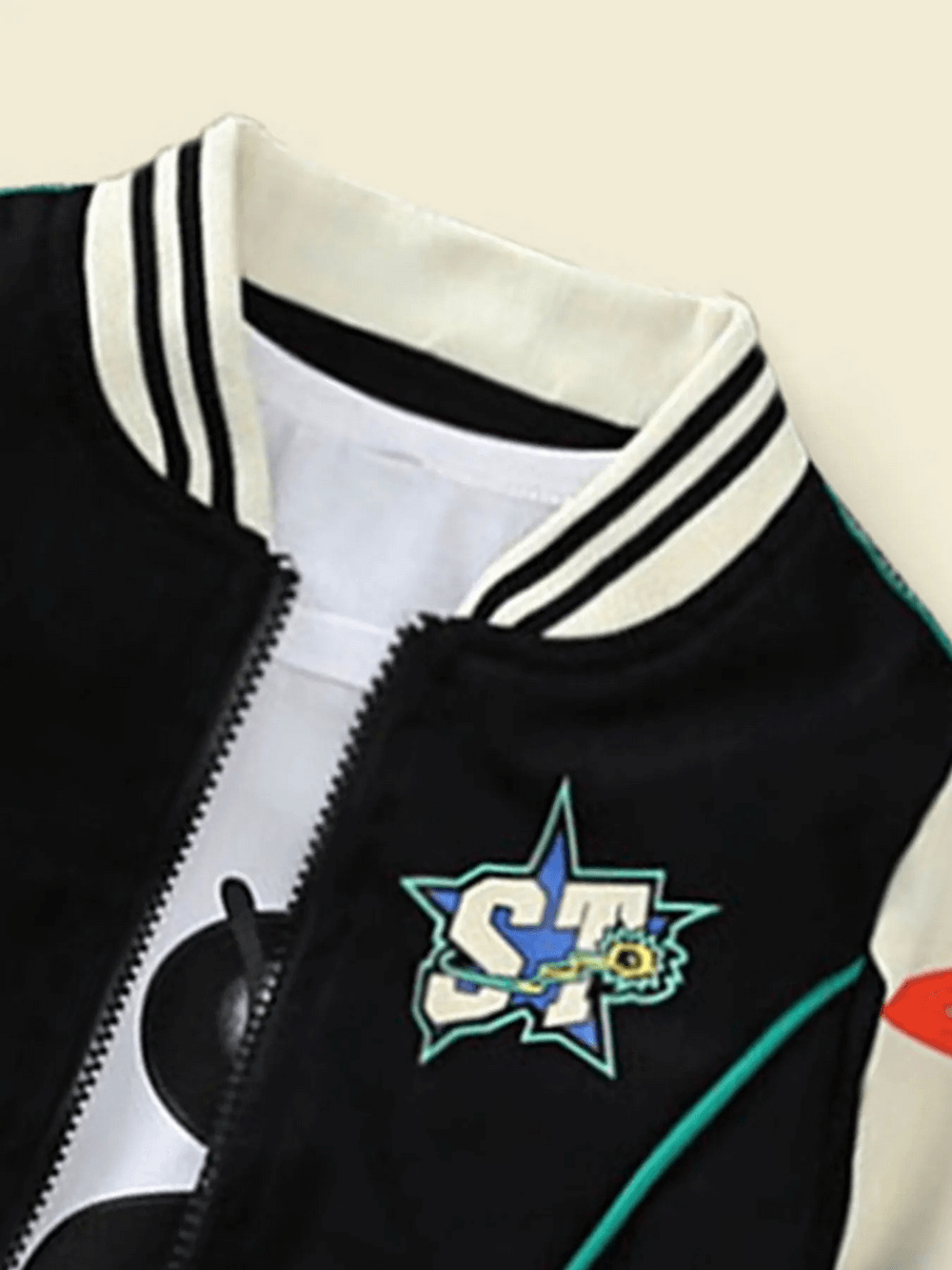 Kids contrast varsity jacket SF3119 with star print and STARTER lettering, featuring bold color-block design for trendy style.