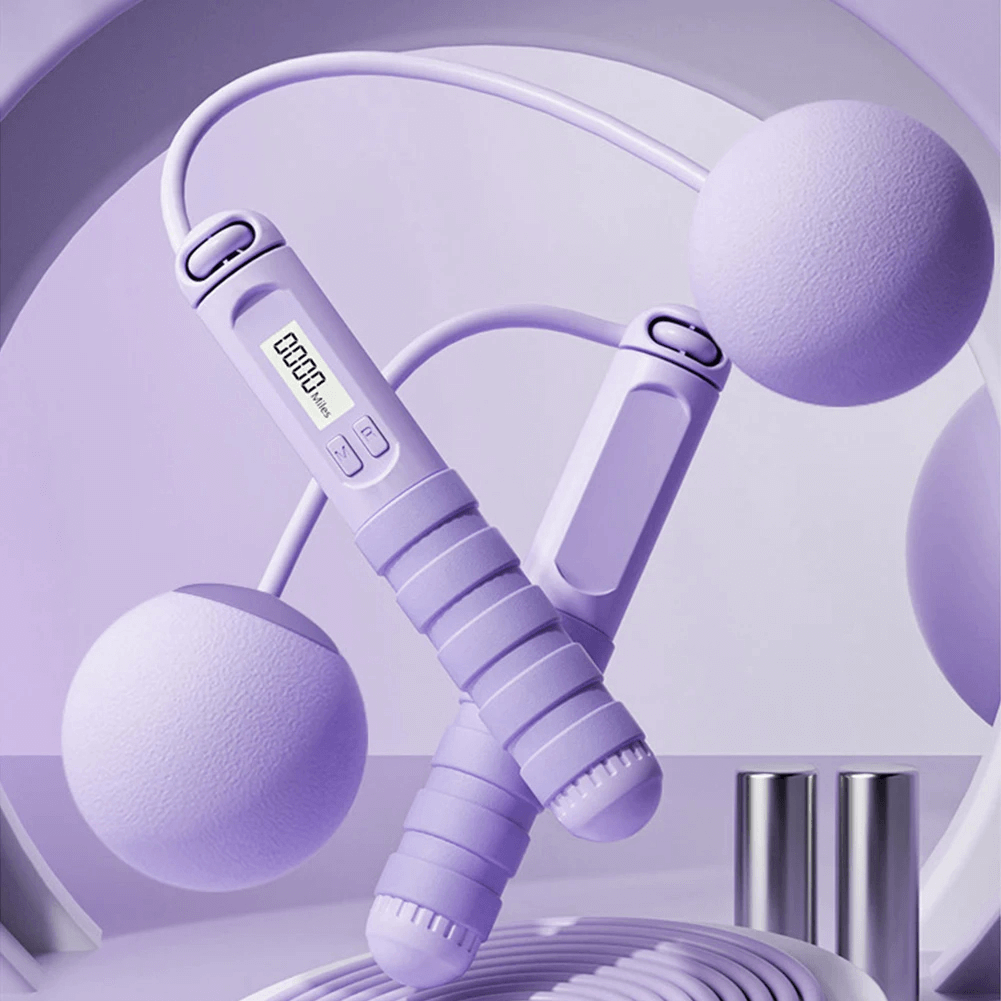 Cordless jump rope with calorie counter display and ergonomic handles in a sleek purple design for indoor fitness.