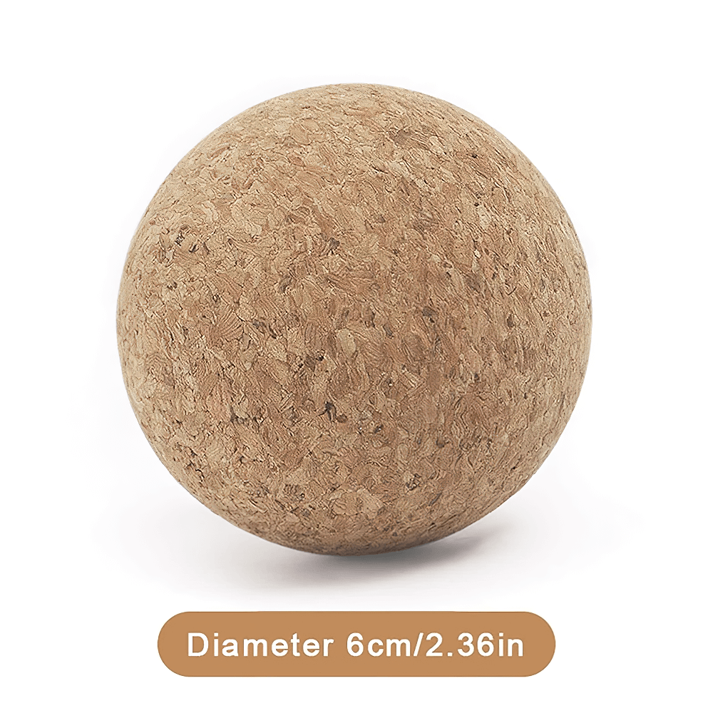 Natural cork massage ball for fascia and trigger point therapy, 6cm diameter. Ideal for muscle release in yoga and fitness routines.