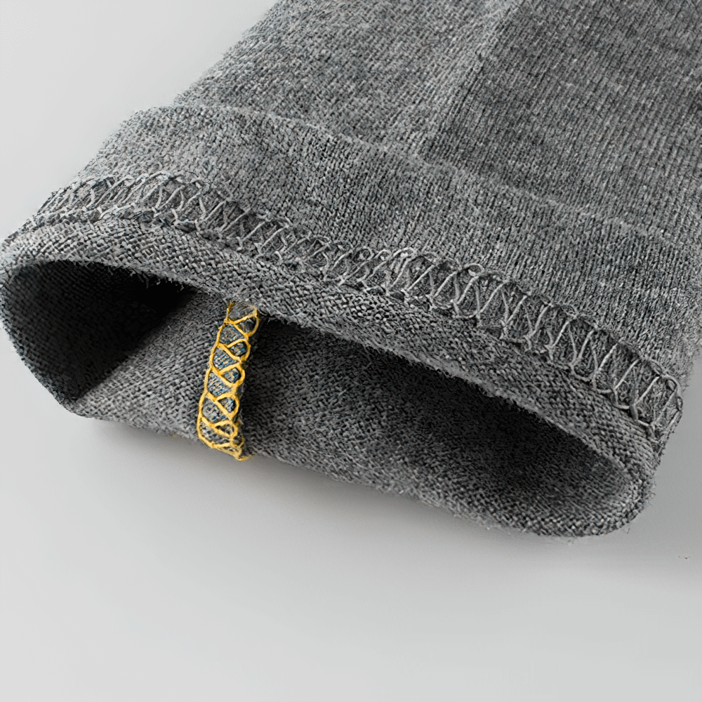 Close-up of sleeve detail on Cotton Long-Sleeved Raglan Top for Boys - SF3607, showcasing soft grey fabric and stitching design.